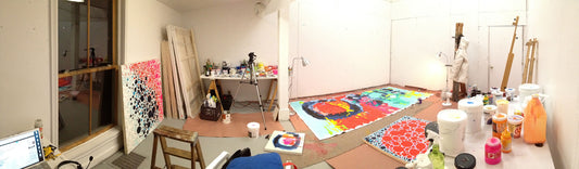 Art studio filled with colourful abstract paintings by artist/painter Claire Desjardins.