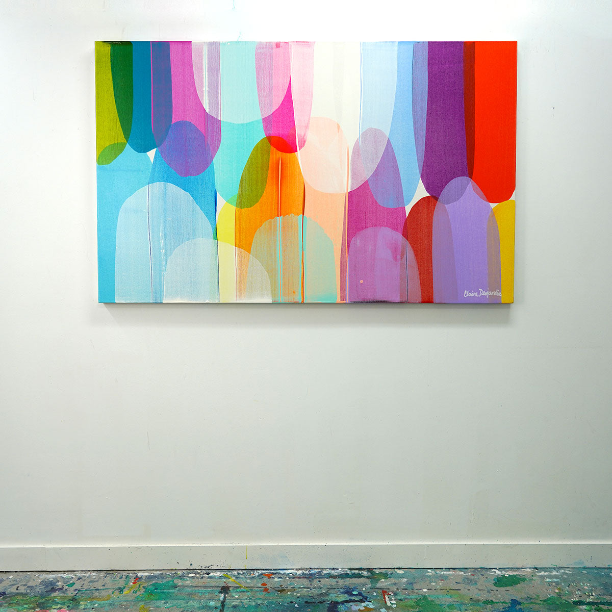 Claire Desjardins' original abstract painting, Deliberately Divine, hung on the wall in her studio.