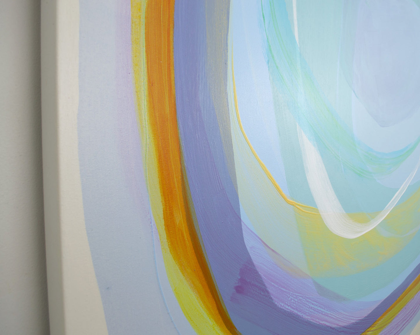 Abstract artwork with swirling colors on a white background