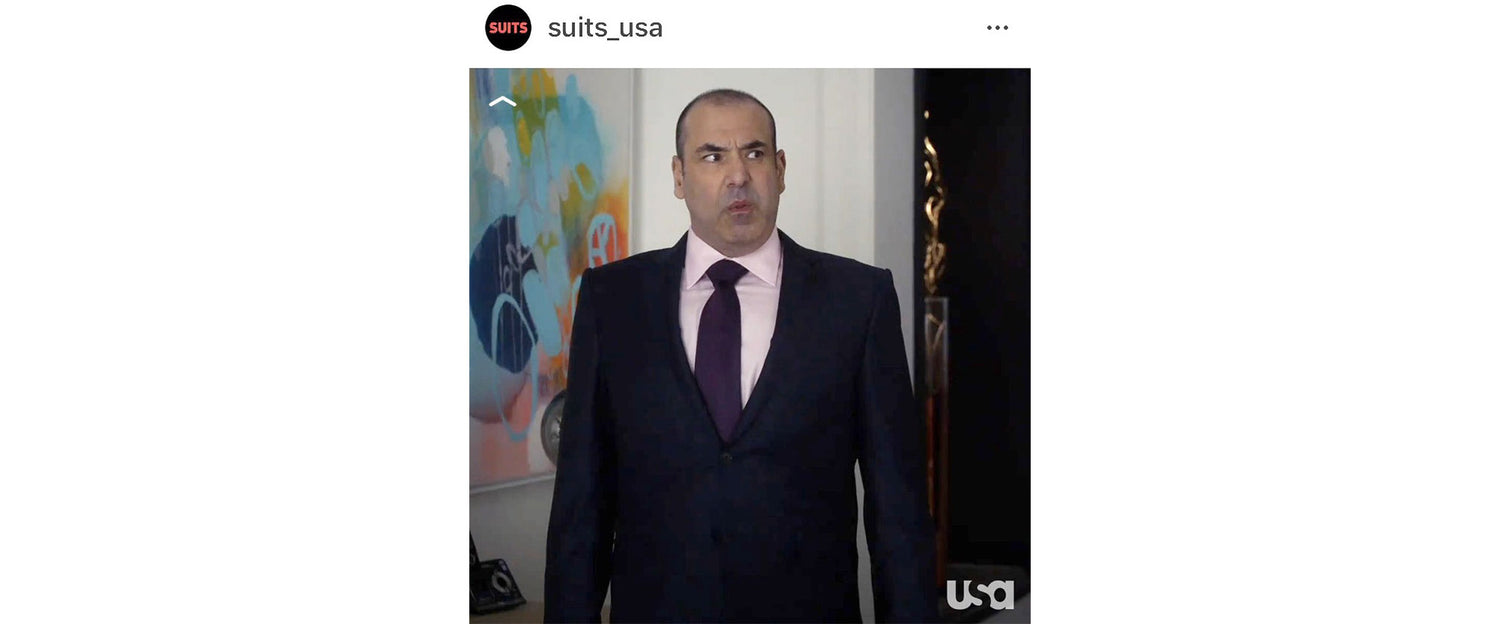 instagram post by @suits_usa. Louis Litt stands infront of an abstract painting by Claire Desjardins titled "The Right Thing"